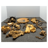 Assorted Native American wall decor to include dream catchers, animal skins, spirit mask wall decor, and more. See pictures for details.