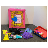 Vintage Barbie doll case, includes assorted Barbie clothing, see pictures for details.