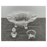Lovely footed and etched centerpiece bowl, believed to be Vintage Heisey dolphin footed etched glass bowl, also comes with a matching salt shaker and mini footed a bowl, see pictures for details.
