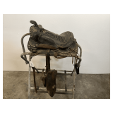 Vintage western saddle, with decorative stud work. See pictures for details.