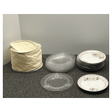 Lovely vintage saucers with floral motif, also includes etched clear glass dessert plates, believed to be vintage Heisey glass, approximately 15+ pieces total, also comes with plate storage cover, see