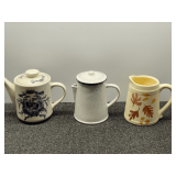 Small ceramic decorative pitchers, two with lids, three pieces total, see pictures for details.
