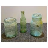 Vintage/antique collectible bottle and jars, three pieces, includes a Ben Rickert 8-sided green glass apothecary jar, often with a thick, hand-blown style. See pictures for details.