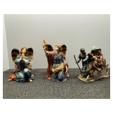 Angel figurines, also includes a Joseph and Mary with baby Jesus figurine, foot is broken but piece is included and hand is chipped, see pictures for details.