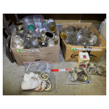 Large assortment of canning jars and lids, see pictures for details.