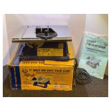 QEP 7” wet or dry tile saw, like new condition, powers up, working condition unknown, comes with the original box. See pictures for details.