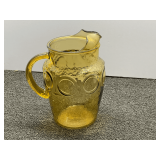 Vintage amber glass pitcher believed to be Anchor Hocking, 'Heritage Hill' pattern, see pictures for details.