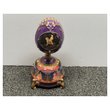The Bradford Exchange Russian Nutcracker heirloom porcelain musical egg. See pictures for details.