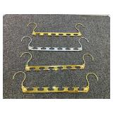 Metal, swivel “Wonder” hangers, set of four, see pictures for details.
