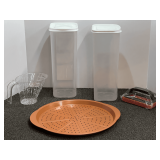 Assorted kitchen items to include a pizza pan, bread dispensers, and more. See pictures for details.