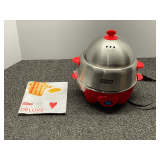 Dash deluxe egg cooker, comes in original box, appears to have never been used, see pictures for details.