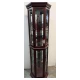 Lighted corner curio cabinet, see pictures for details.