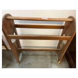 Wooden blanket rack, some damage on lower legs, see pictures for details.