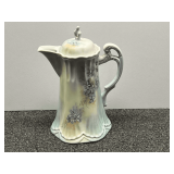 Lovely multicolored porcelain tea/coffee pot with floral motif, see pictures for details.