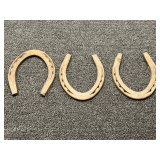 Set of Five Metal Horseshoes
