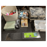 Assortment of crafting supplies to include a large sewing basket with contents, a lip edge ruler, cube bag with assorted ribbon, foam blocks, and much more. See pictures for details.