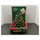 Lighted ceramic Christmas tree, comes in original box, see pictures for details.