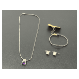 Assorted Jewelry: 14K Stamped Gold Necklace, Sterling Silver Bracelet, and Earrings
