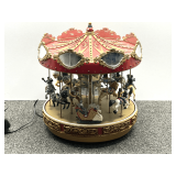 Mr. Christmas Royal Marquee Deluxe Grand Carousel, does work, see pictures for details.
