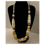 VINTAGE AFRICAN HAND CARVED BONE AND COPAL/AMBER NECKLACE 24" LONG