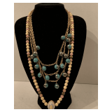 VINTAGE HANDMADE PINK, CREAM & GOLD BEADED NECKLACE W/ LARGE POTTERY PENDANT 24" & TRIPLE STRAND GOLD TONE CHAIN NECKLACE W/ TURQUOISE GREEN COLORED BEADS 18" LONG