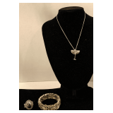 SHADES OF PINK RHINESTONE STRETCH BRACELET (1 SMALL STONE MISSING), CRYSTAL MARTINI GLASS NECKLACE ON SILVERTONE CHAIN 16" LONG & FASHION STRETCH RING