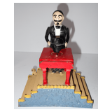 Cast Iron Magician Coin Bank