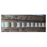 FIRE HOSE MOUNTED TO 2X8 NEARLY 5' LONG - MADE TO HOLD BOAT PADDLES ON WALL OR MAKES A GREAT DOCK BUMPER