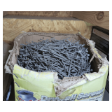 VERY LARGE BOX FILLED WITH RIBBED FINISHING NAILS