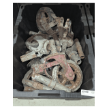 TUB FILLED WITH LARGE INDUSTRIAL CASTERS