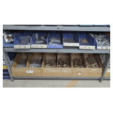 PLASTIC PARTS BINS AND CONTENTS ON BOTTOM TWO SHELVES MARKED 2025 INCLUDING 90° BRACKETS, LARGE SCREW IN EYE BOLTS, BRACKETS, COPPER PLUMBING ELBOWS, AND MORE