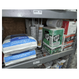 TILE MORTAR, FIRE BLOCK FOAM, DAP ROOF SEALER, AND MORE IN SHELF SECTION MARKED 2220