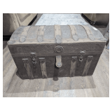 OLD STEAMER TRUNK WITH CASTERS