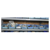 PLASTIC PARTS BINS AND CONTENTS ON SINGLE SHELF MARKED 2007 INCLUDING DOOR HARDWARE, BRACKETS, AND MORE