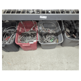 CONTENTS OF FOUR TUBS IN FLOOR AREA MARKED 2169 INCLUDING BRAIDED WATER SUPPLY LINES, COPPER CORRUGATED WATER HEATER CONNECTORS, AND MORE