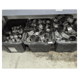 THREE TUBS OF NO-HUB CAST IRON PIPE COUPLINGS, THREE SIZES ORGANIZED BY TUB