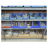 PLASTIC PARTS BINS AND CONTENTS ON BOTTOM THREE SHELVES MARKED 2017 INCLUDING LARGE BOLTS, HINGES, CONCRETE ANCHORS, AND MORE