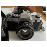 CANON A.E.-1 PROFESSIONAL CAMERA W/ FLASH, LENSES, FILTERS & MORE IN METAL CARRIAGE CASE