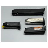 Assortment of magazines to include Glock, Smith & Wesson, and more. Four magazines, includes some .45 auto brass, tub is not included, see pictures for details.