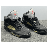 Air Jordan tennis shoes, size unknown, see pictures for details.