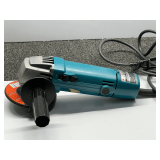 Makita 4 inch disc grinder, powers up, see pictures for details.