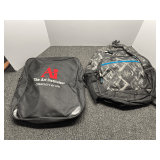 Backpack, and black zippered storage bag, see pictures for details.