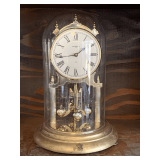 VINTAGE RETIREMENT GIFT FROM B&W HOWARD MILLER "MARGUERITE" ANNIVERSARY CLOCK - BRASS WITH GLASS DOME CHIMES 12" TALL X 6 1/2" WIDE