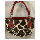 BLACK & WHITE COW PATTERN LEATHER POCKETBOOK WITH RASPBERRY TRIM