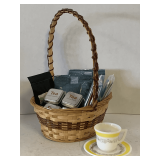 BASKET FULL OF FLAVORED TEAS AND ANTIQUE WHITE MILK GLASS HAND PAINTED DEMITASSE CUPS/SAUCER