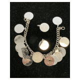 STERLING SILVER CHARM BRACELET WITH 15 STERLING SILVER DISC (APPROX 38.69 GRAMS)