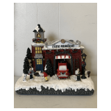 RESIN CHRISTMAS VILLAGE FIRE STATION WITH LED LIGHTS 10" WIDE X 7" DEEP X 10" TALL