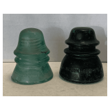 2 VINTAGE GREEN GLASS INSULATORS - W.E. ROCKFIELD & HEMINGRAY - BOTH HAVE SOME DAMAGE