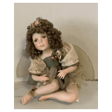GEPPETTO PORCELAIN/BISQUE FAIRY DOLL IN SITTING POSITION 14" TALL X 7" WIDE (HAND DAMAGED)
