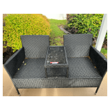 Patio…PE rattan conversation loveseat with a built-in tempered glass table, see pictures for details.